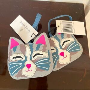 Two Vera Bradley cat luggage tags